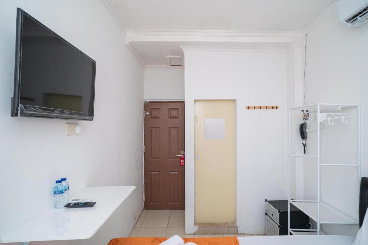Готель Reddoorz @ Aralia Harapan Indah Pulokendal Екстер'єр фото